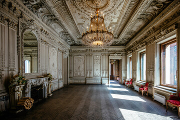 Fototapeta premium Large decorated baroque hall at old Brusnitsyns' mansion in St. Petersburg, Russia, May 12, 2024