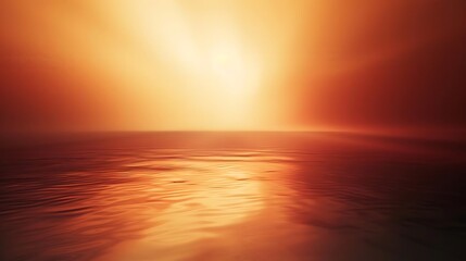 A serene sunset over a calm ocean, with warm hues reflecting on the water's surface.