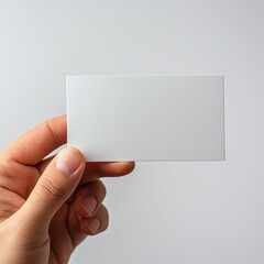 Hand Holding Blank White Business Card Mockup.