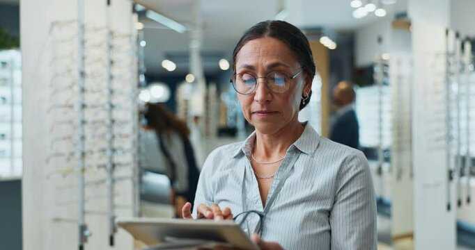 Woman, optometry and tablet for eye care, medical professional and consultation as optometrist. Female person, tech and spectacles for exam in clinic or ophthalmology center for size, frame and lens