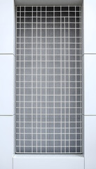 Texture and background of white metallic plate and screen mesh, metallic wall of modern building. White square paneling on the wall. White aluminum trapezium texture isolated with white highlights, 