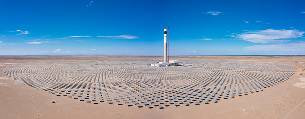 Aerial photo of a molten salt tower solar thermal power station under construction in Jiuquan, Gansu Province, China