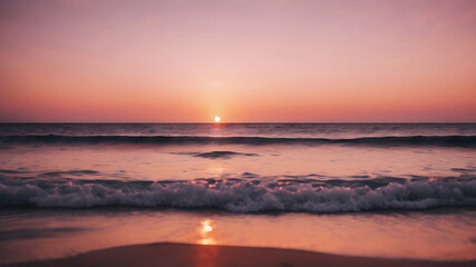Obraz premium A serene sunset over a calm ocean with soft pink and orange hues