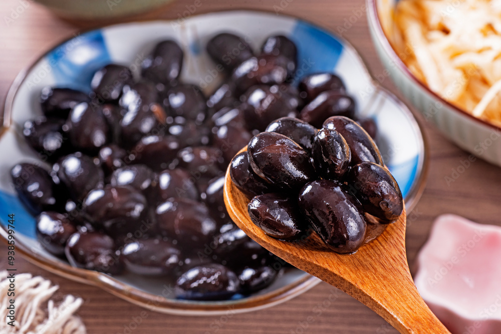 Wall mural sweet simmered black beans in a plate