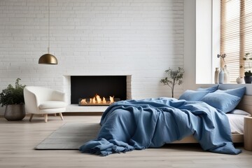 Bed with blue pillows and blanket by the fireplace facing the white brick wall. Loft, Scandinavian interior design modern bedroom