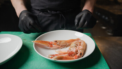 chef shells red prawns Inside A Professional Kitchen