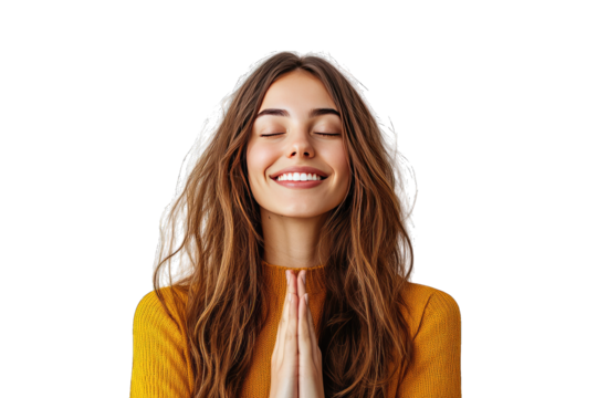 A joyful woman with long hair expressing gratitude with a sincere smile and hands clasped in prayer. Radiates positivity and warmth.