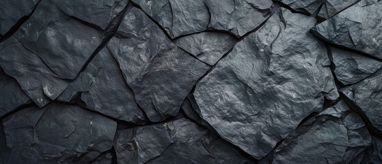 Fototapeta premium Black slate stone texture background close up dark grey rock surface rough grunge pattern in gray long background 
