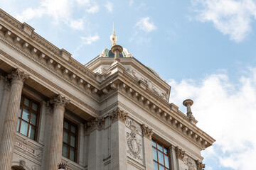 Decorated with stucco bas reliefs facade of Peoples Museum on famous Wenceslas Square in Prague in Czech Republic