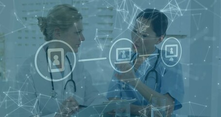 Discussing patient data, medical professionals with network connections animation over them