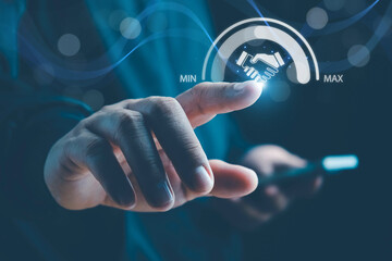 Trusted partner. Trustworthy collaboration, company or contract. Confidence to work together. Businessman turning knob to highest trust levels. Build trust in business and finance relationships.