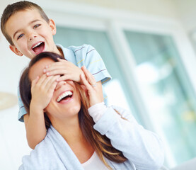 Playful, mother and eyes with kid in home for funny bonding, joke and humor together on weekend....