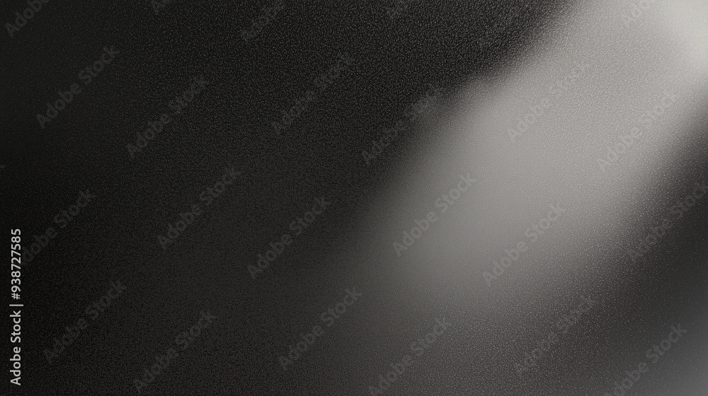 Fototapete Black matte textured background with floating dust particles illuminated by soft light in the top right corner, creating a deep contrast between black and white. This abstract design emphasizes textur