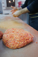 The Art and Skill of Fresh Meat Preparation Within the Traditional Environment of a Butcher Shop