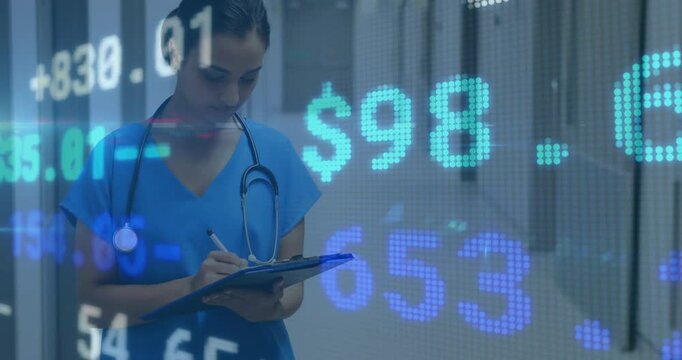 Writing on clipboard over financial data animation, medical professional in office