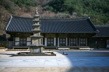 Fototapeta premium View of the old stone pagoda in the Buddhist temple