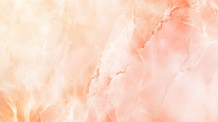 This elegant abstract background features soft hues of peach and cream, creating a warm and inviting texture perfect for designs or layouts. 