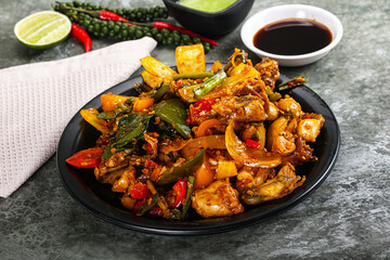 Vietnamese cuisine - fried frog with vegetables