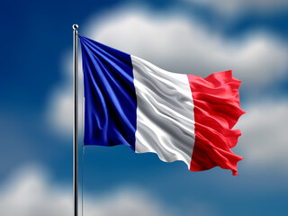 France flag flying on blur blue clouds background.