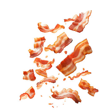 Falling pieces of bacon isolated on a transparent background
