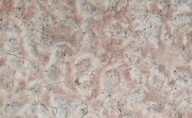 Cracked ground background in the top view for graphic design or wallpaper