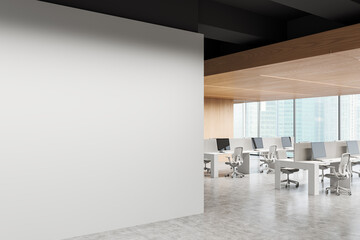 Empty office space with blank wall and modern workstations. 3D Rendering