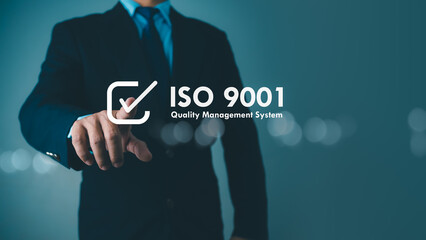 ISO 9001 Standard certification standardisation quality control concept. Businessman point your finger at text ISO 9001 for quality management of organizations, Certified and quality.