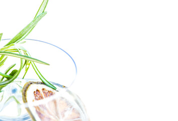 Cocktail Port Tonic (Porto Tonic) with port wine, tonic water, slice of orange and rosemary