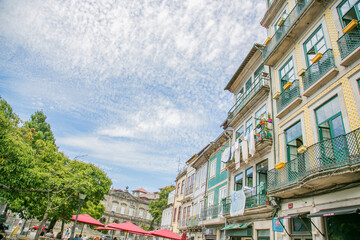 Traditional portugueses buildings with colorful facade and tiles, Porto, Portugal