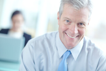 Obraz premium Business, mature man and smile at office on portrait with confidence for company growth as accountant. Male person, happy and satisfied as entrepreneur for professional career or job opportunity