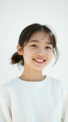 Portrait of a smiling young woman with brown hair