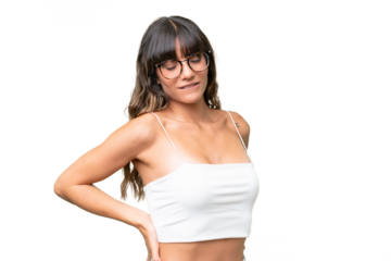Young caucasian woman over isolated background suffering from backache for having made an effort