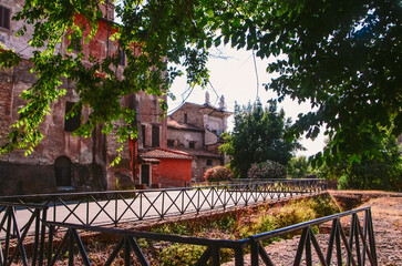A charming courtyard nestled amidst the bustling streets of Rome.