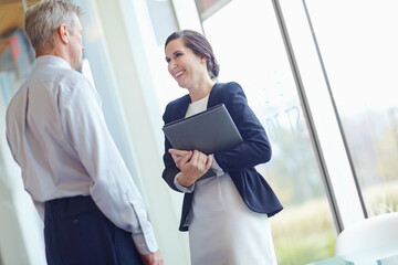 Fototapeta premium Conversation, folder and laughing with business people in office together for feedback or review. Collaboration, documents or funny with happy employee and mentor planning in corporate workplace