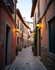 A tranquil evening in a picturesque village, with warm street lamps casting a soft glow on narrow cobblestone streets lined with colorful houses.