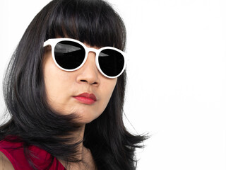 Fototapeta premium Woman sunglasses brown Hair lifestyle travel summer tropical, young people face skin tan model Portrait girl pretty posing, eye patch pterygium surgery eye medical,concept for health.