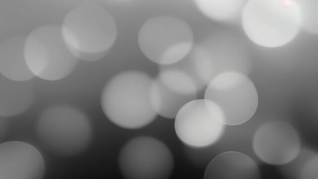 Animated Abstract and Fading white Particles designed black and white background, texture or pattern concept. White luxury bokeh background. Dust and glitter particles background