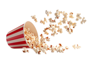 Spilled popcorn from striped bucket, isolated on transparent background