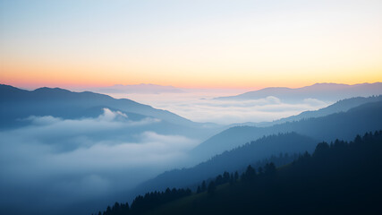 Obraz premium A tranquil mountain landscape with a mist-covered valley at dawn