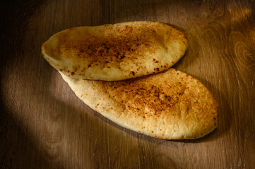 traditional Cypriot pita, lavash, bread on a wooden table