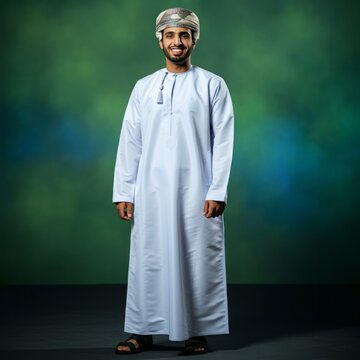 Omani arab man posing for camera on a colorful background