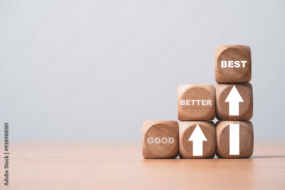 Poster Good better and best on wooden block cube with up arrow for enhance and development product and service in the best condition concept.