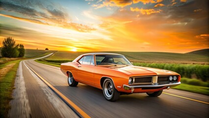 Obraz premium Vintage orange 1969 Charger muscle car with chrome wheels and sleek design speeding down a country road, evoking a sense of freedom and adventure.