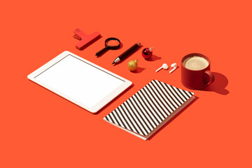 Digital tablet mockup, template on Christmas concept red background with personal accessories, and office supply