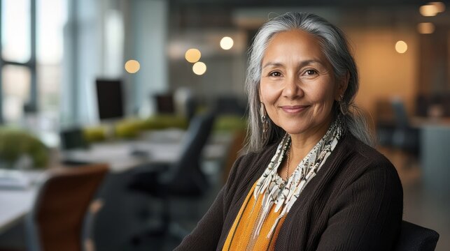 senior indigenous business woman portrait in modern office, diversity.