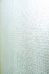 Drahtsicherheitsglas. Semitransparentes Glas mit gepunkteter Struktur. Wire safety glass. Semi-transparent glass with dotted structure.