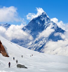 hikers on glacier and mount Ama Dablam