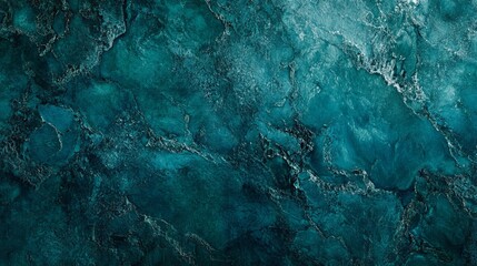 Obraz premium Rich dark bluegreen marbled stone texture background resembling a rock texture with elegant mottled shades of dark and light bluegreen Ideal for banner design