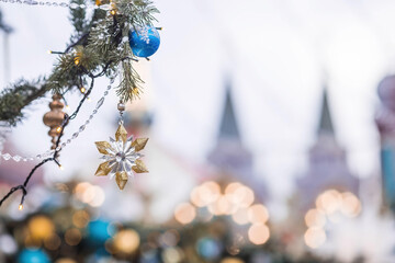 Beautiful festive decorations on the Christmas tree. Close-up. Beautiful Christmas background. The concept of decorations and decor for the new year. New Year's Card 2025