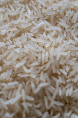 closeup of many white peeled rice grains in a pile